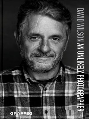cover image of An Unlikely Photographer
